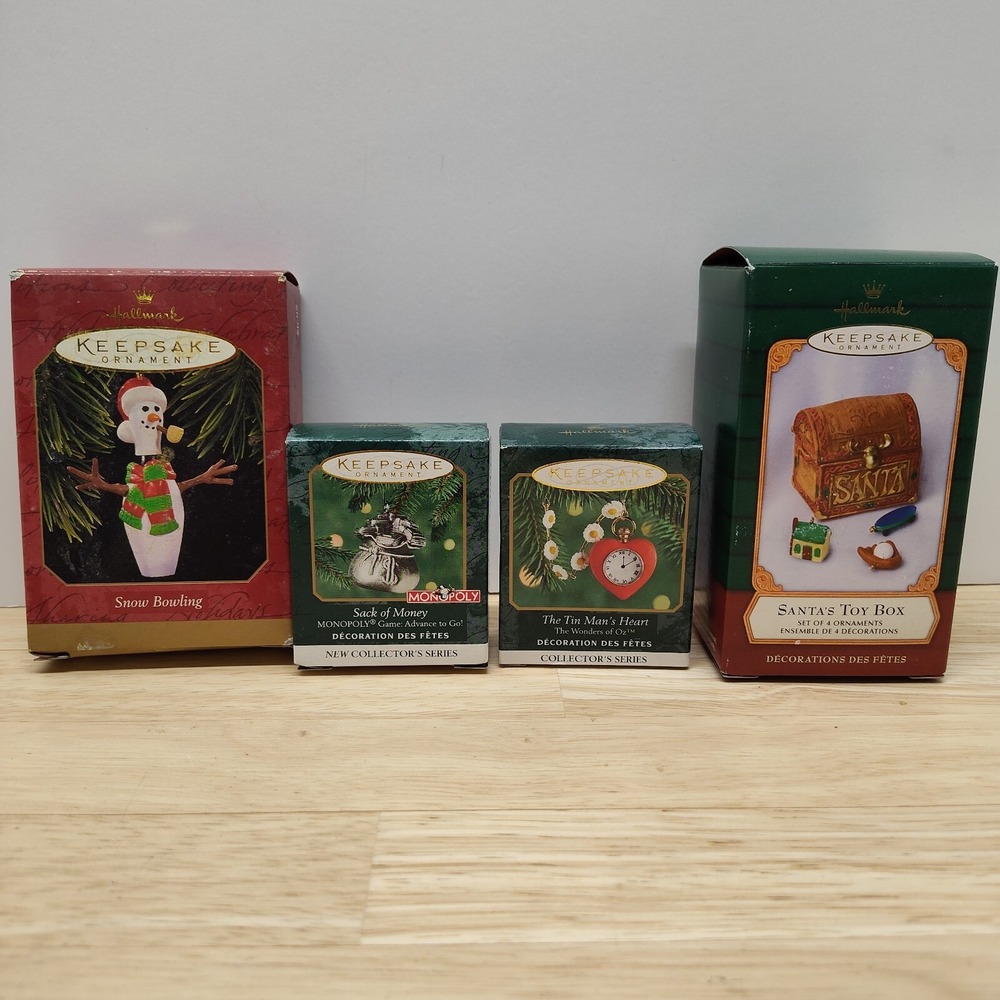 4 Hallmark Keepsake Ornaments Bowling Santa's Toy Box Sack of Money Man's heart